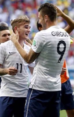 | france | | antoine griezmann x olivier giroud | | a small wooden house |